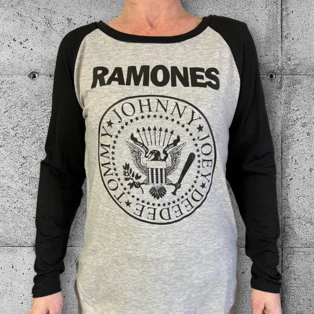 Women's Ramones raglan tee with black sleeves, punk rocker graphic, concrete background