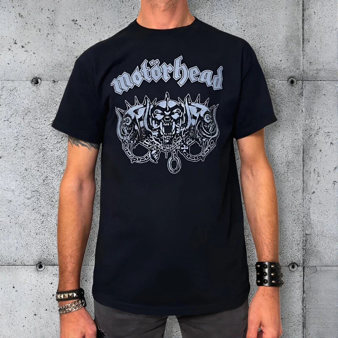 Black Motörhead three-headed warpig graphic t-shirt, punk rock heavy metal merch, worn by man.