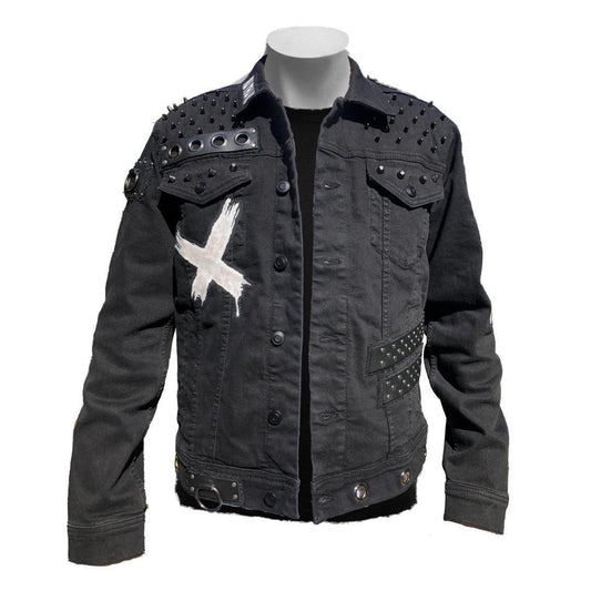 Black denim jacket with punk-inspired design, featuring round head studs on the shoulders, a white 'X' painted on the left side upper pocket, and two black leather strips with gunmetal studs on the lower left side.