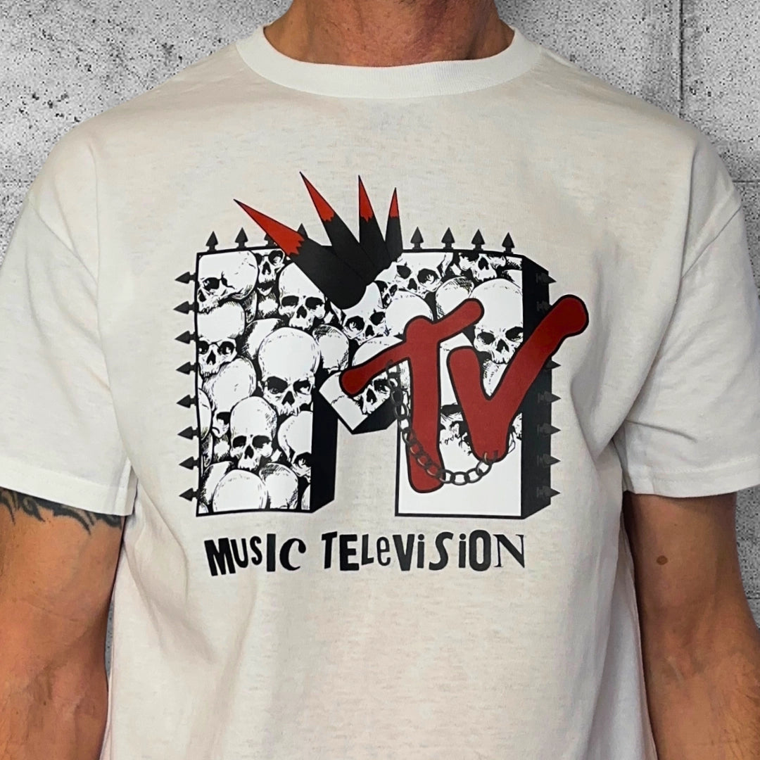 Punk MTV skull graphic T-shirt for men, rocker style clothing on concrete background