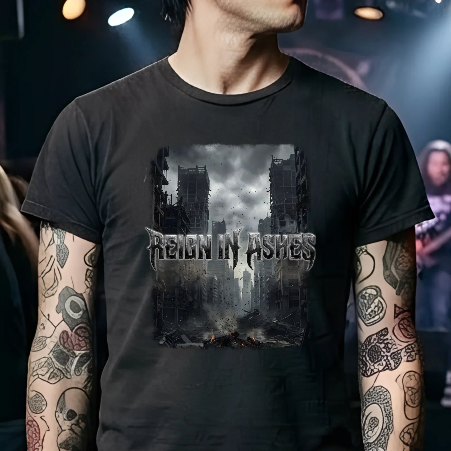 Reign in Ashes punk band tee with apocalyptic city graphic, worn by tattooed rocker