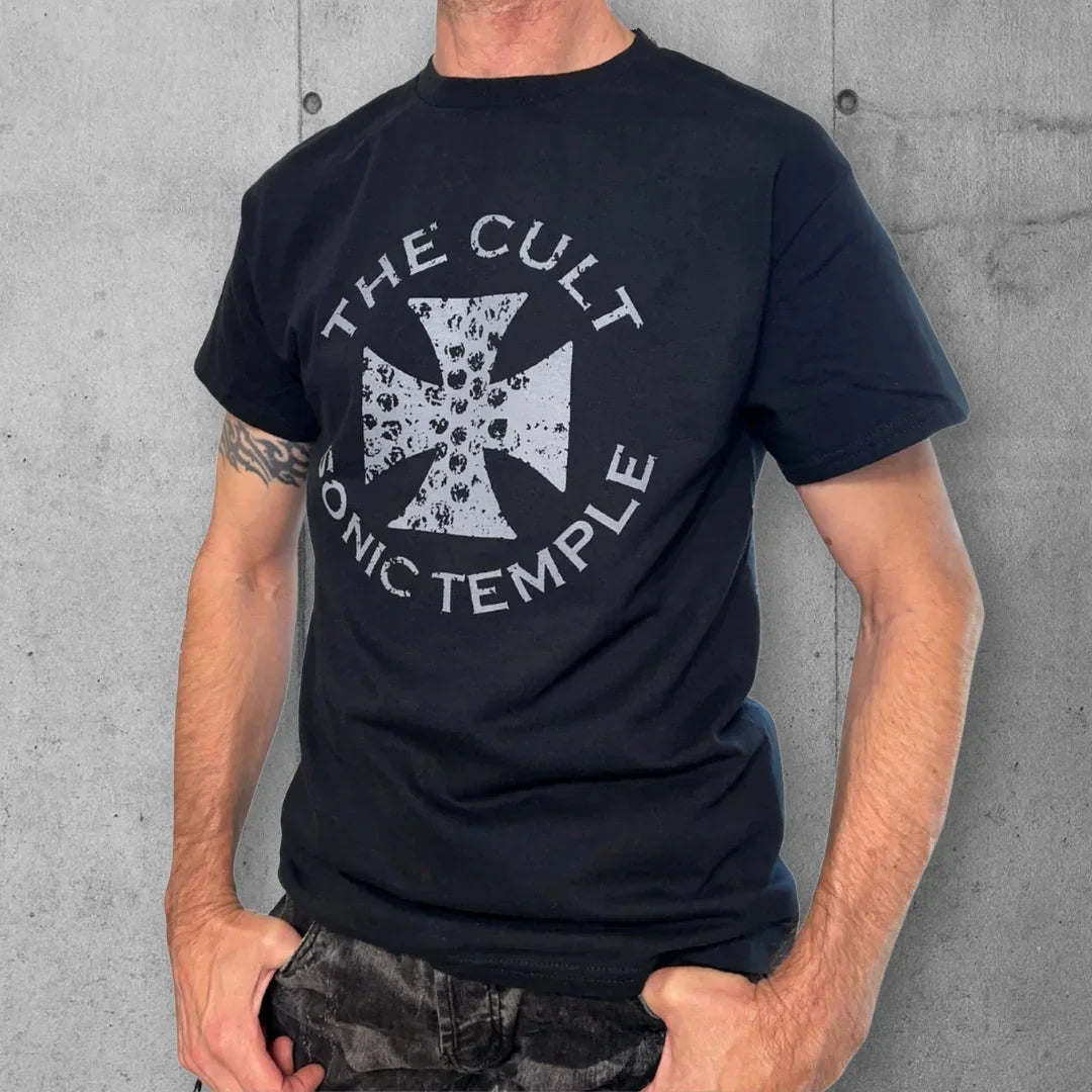 Distressed black The Cult Sonic Temple tee with bold cross graphic, worn by tattooed man